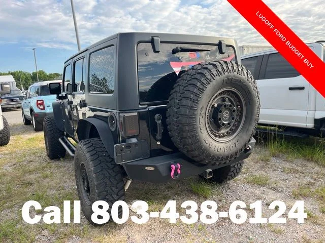 Used 2013 Black Clearcoat Jeep Unlimited Sport image 3