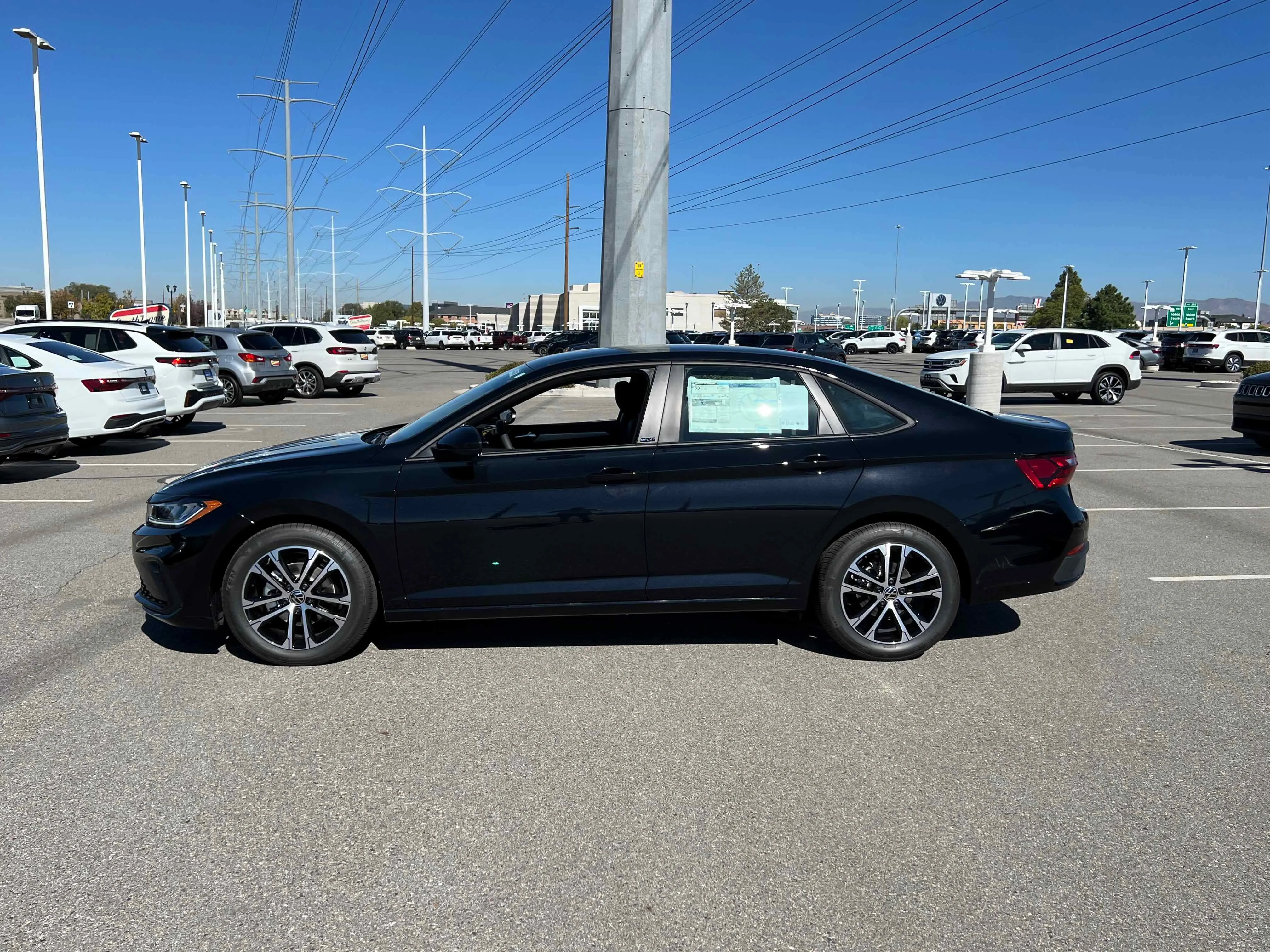 New 2026 Deep Black Volkswagen Sport image 2