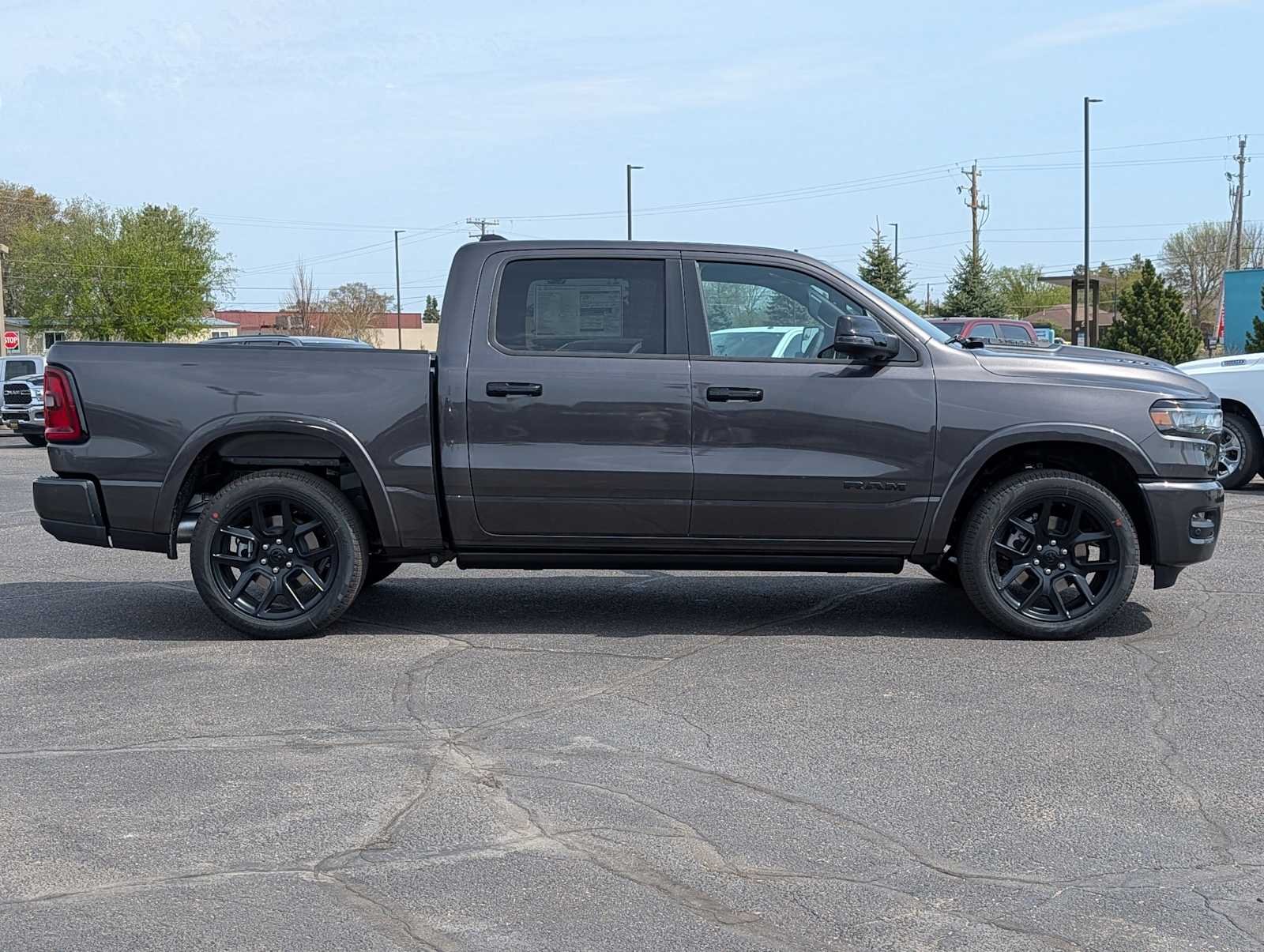 New 2026 Granite Crystal Metallic Clear-Coat Exterior Paint RAM Laramie image 8