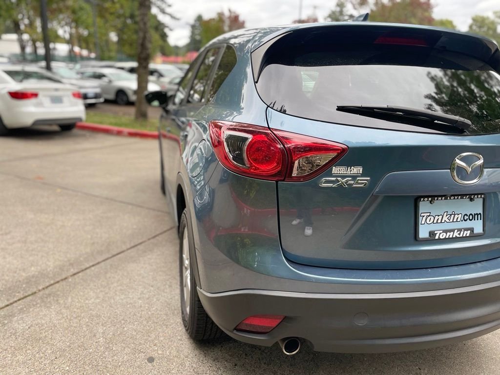 Used 2015 Blue Reflex Mica Mazda Touring image 4