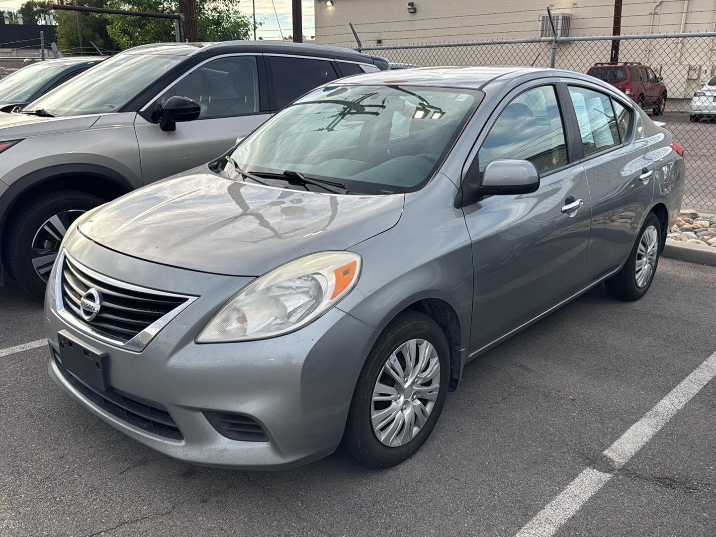 Used 2013 Magnetic Gray Metallic Nissan SV image 1