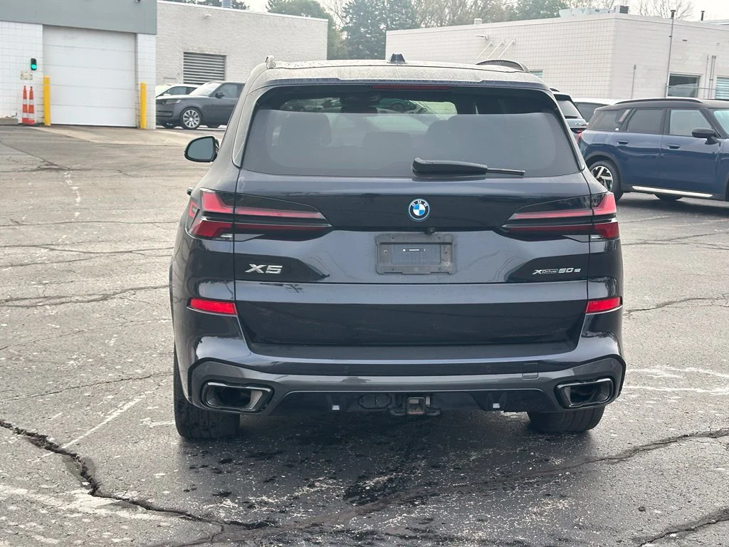 Used 2024 Carbon Black Metallic BMW xDrive50e image 5