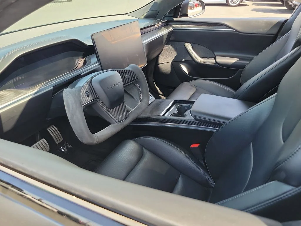 Used 2021 Solid Black Tesla Plaid image 3