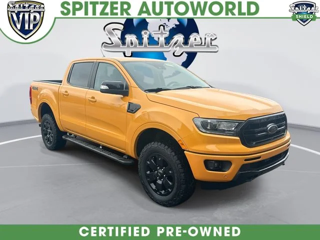 Used 2022 Orange Ford Lariat image 1