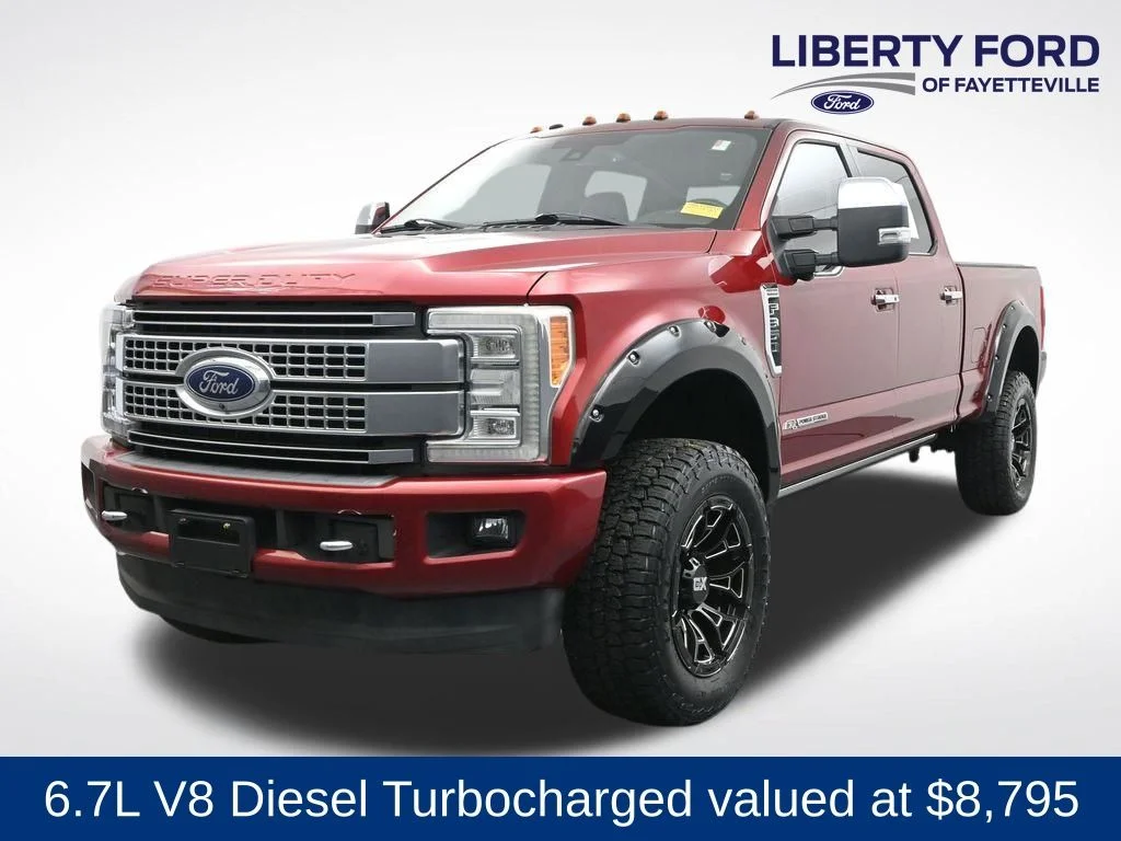Used 2017 Ruby Red Metallic Ford Platinum image 1