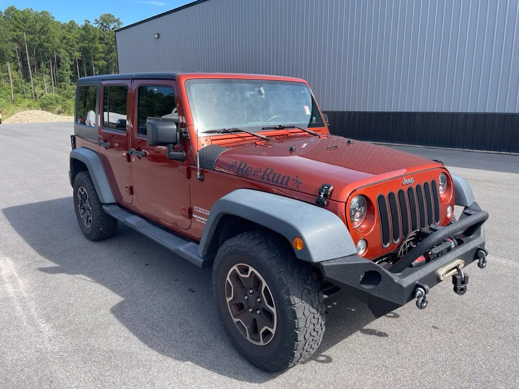 Used 2014 Jeep Wrangler Unlimited Sport with VIN 1C4BJWDG2EL288965 for sale in New Bern, NC