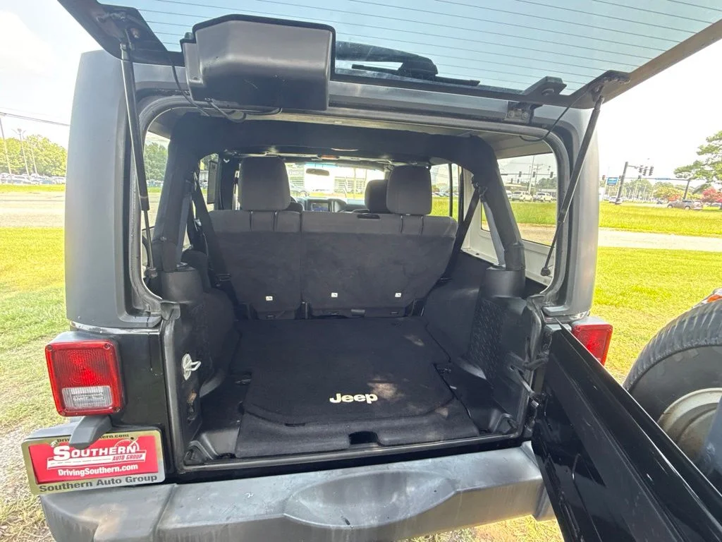 Used 2012 Black Jeep Unlimited Sport image 5