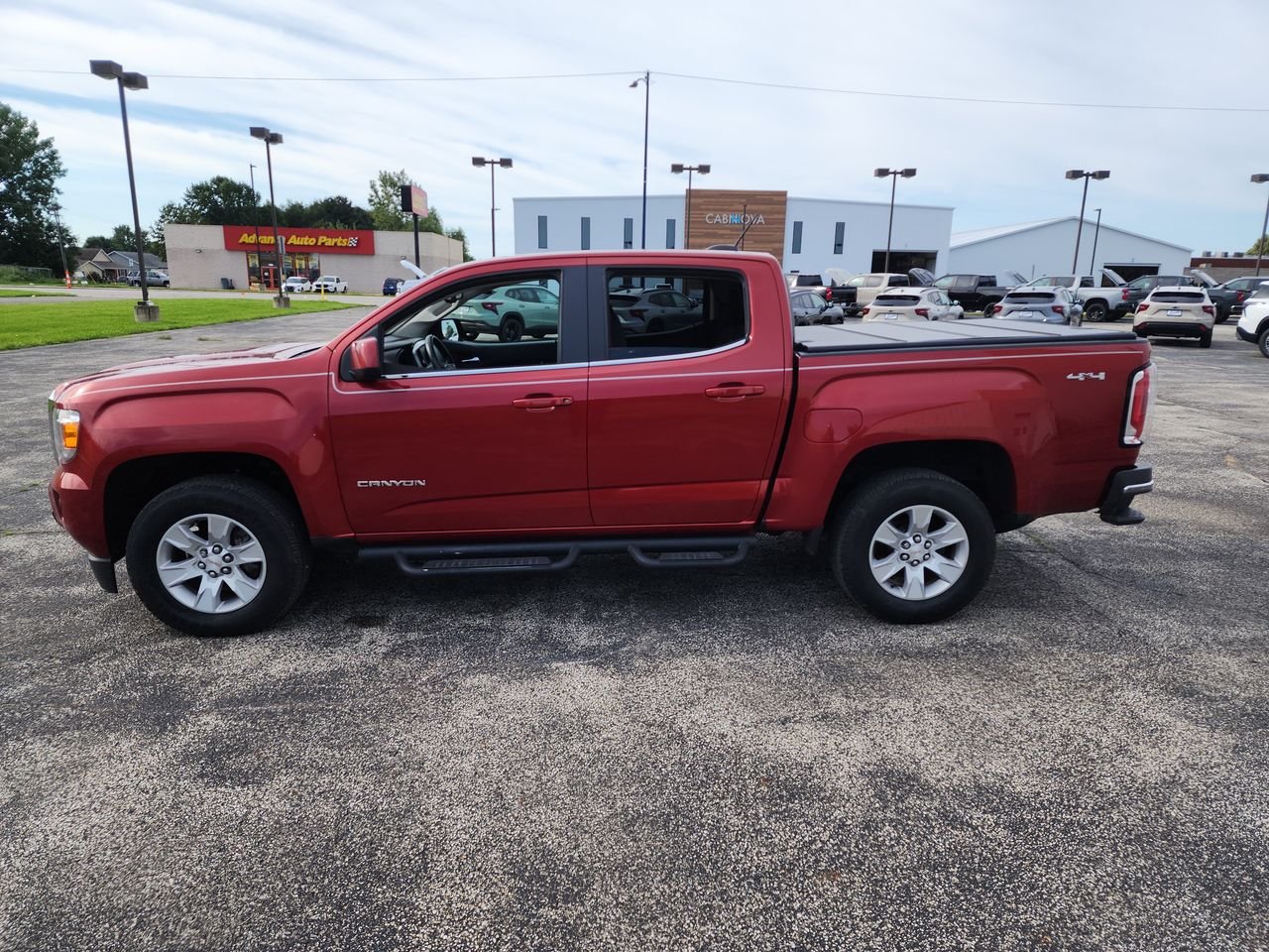 Used 2016 COPPER RED METALLIC GMC 4WD SLE image 5