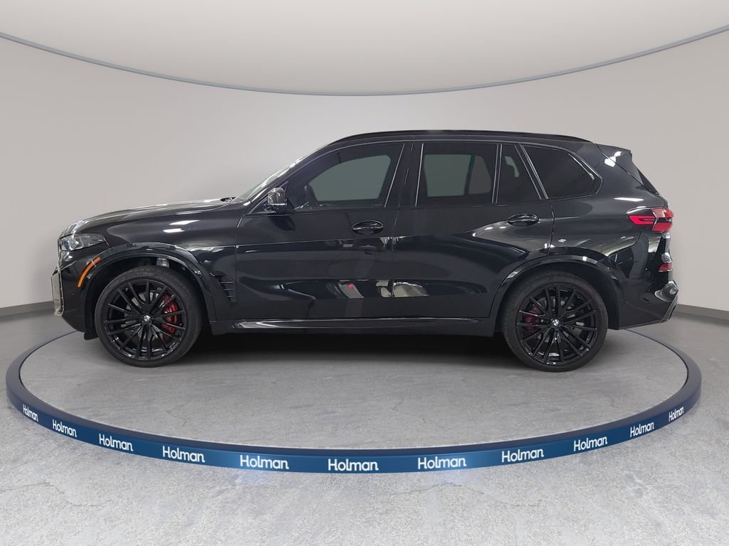 Certified Used 2025 Black Sapphire Metallic BMW sDrive40i image 11