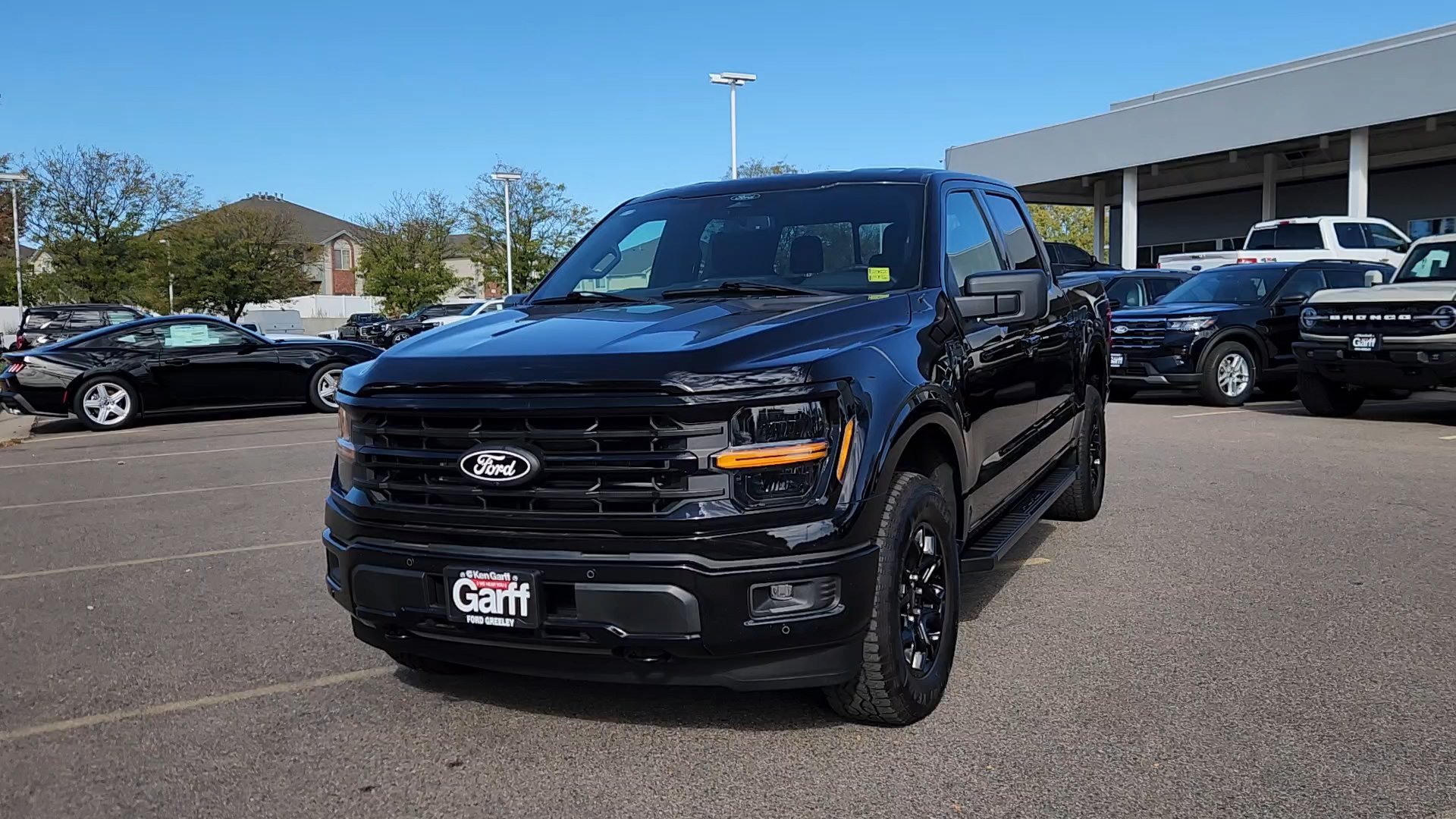 Certified Used 2024 Agate Black Metallic Ford XLT image 3