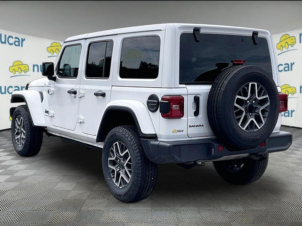 Used 2025 Bright White Clearcoat Jeep Sahara image 4