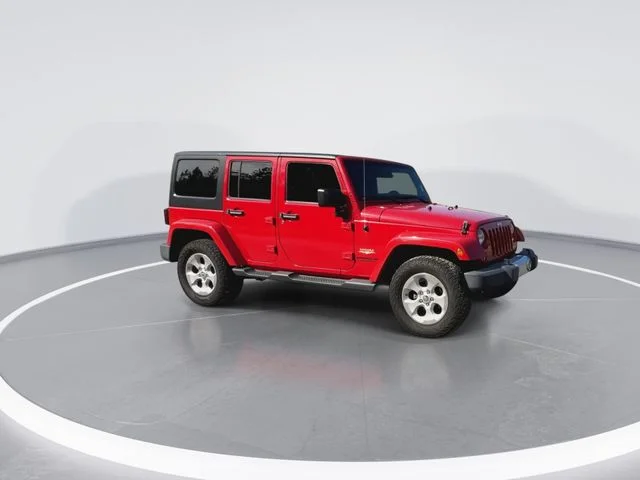 Used 2014 Red Jeep Unlimited Sahara image 13