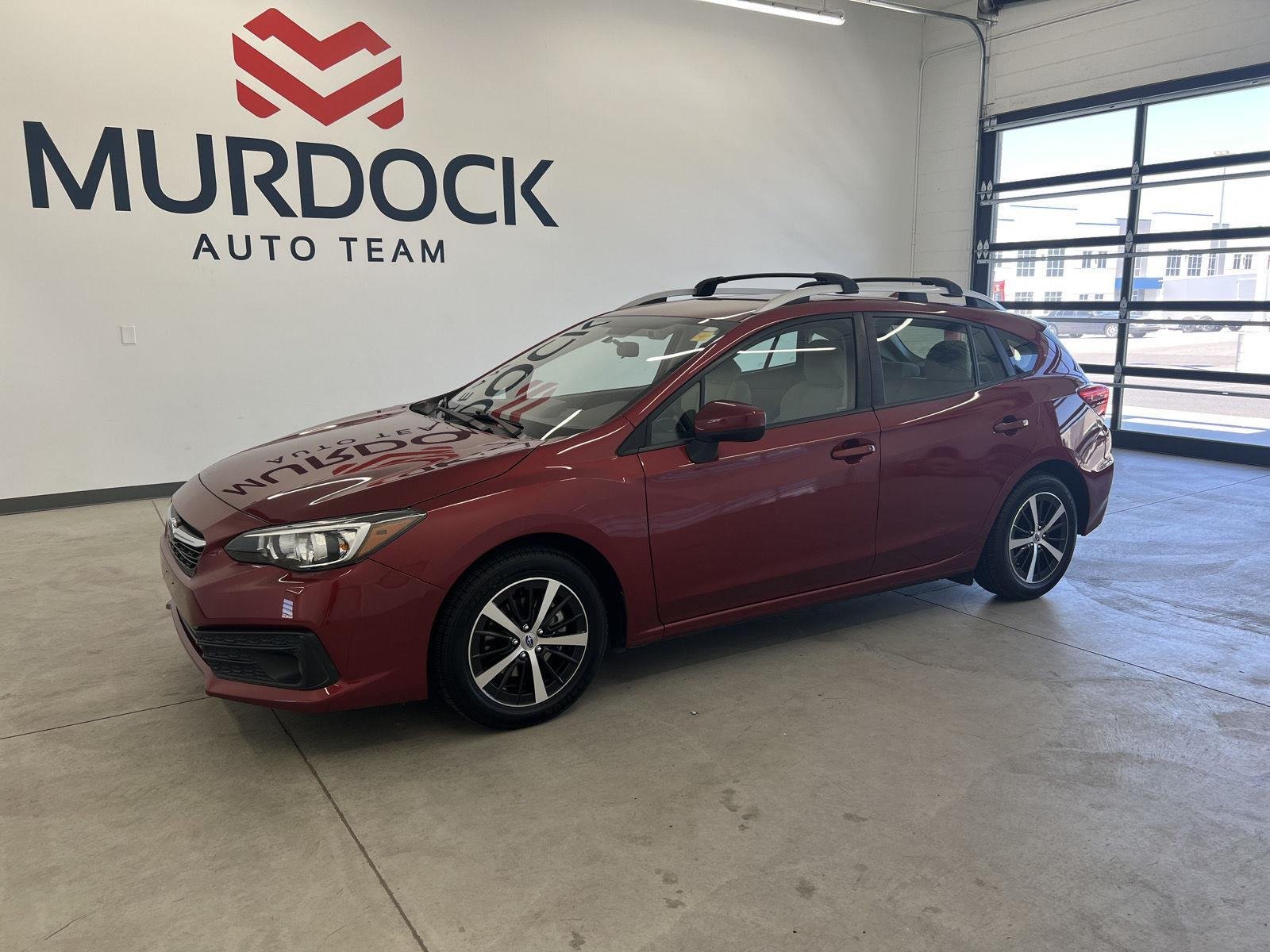 Used 2023 Crimson Red Pearl Subaru Premium image 1