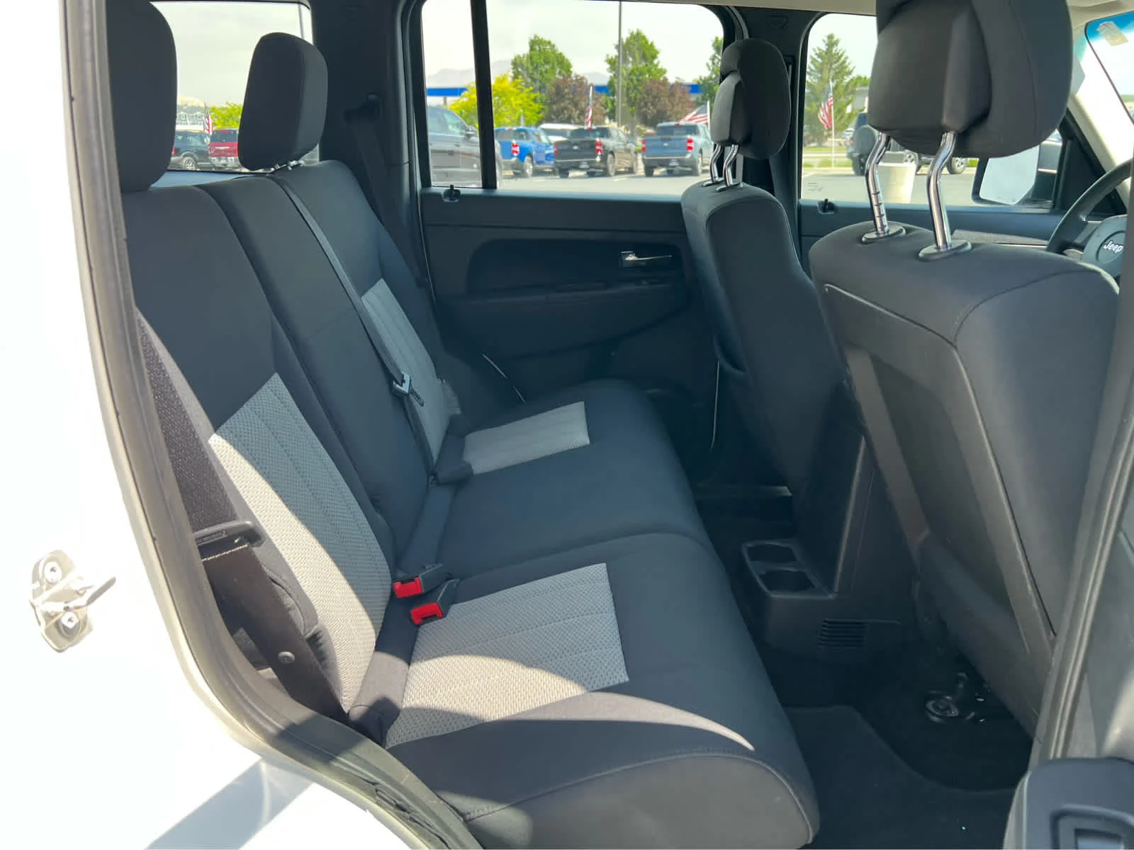 Used 2010 Stone White Clearcoat Jeep Sport image 24