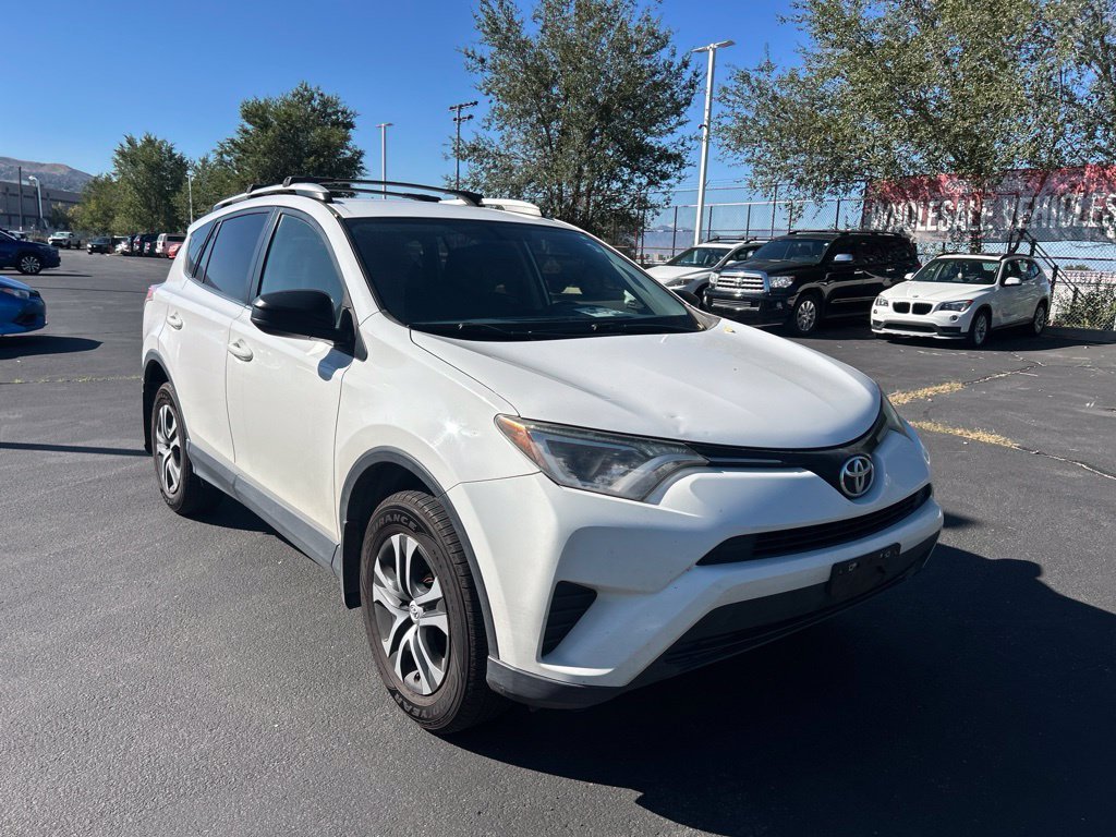 Used 2016 Super White Toyota LE image 3