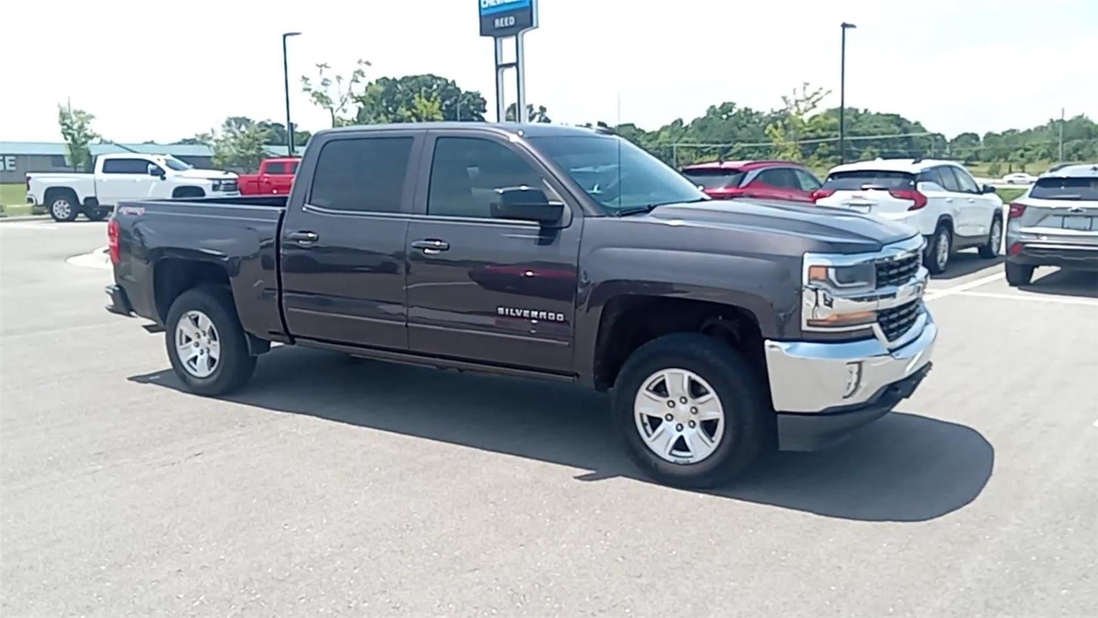 Used 2016 Chevrolet Silverado 1500 LT with VIN 3GCUKREC0GG107610 for sale in Saint Joseph, MO