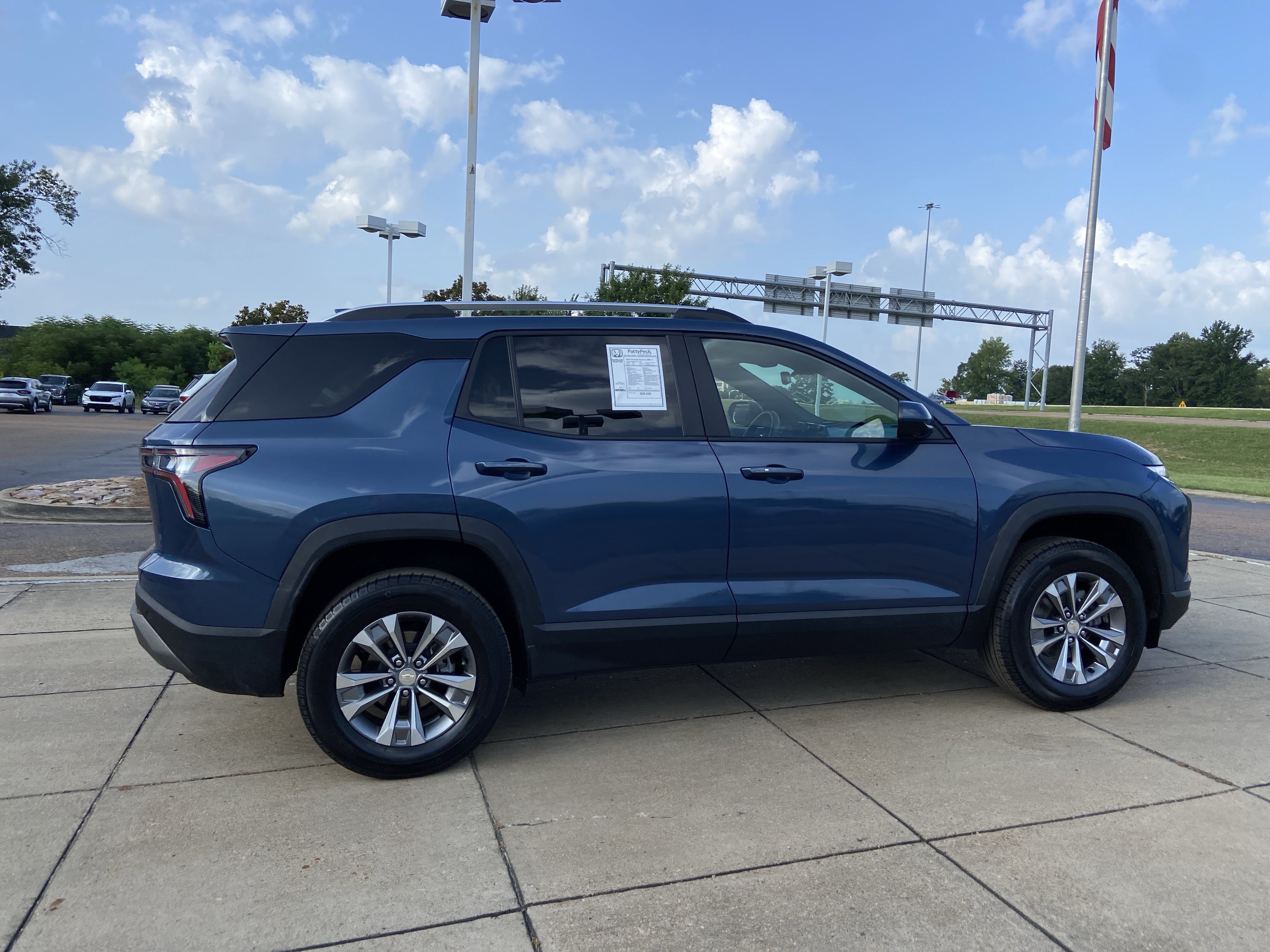 Used 2025 Lakeshore Blue Metallic Chevrolet AWD LT image 12