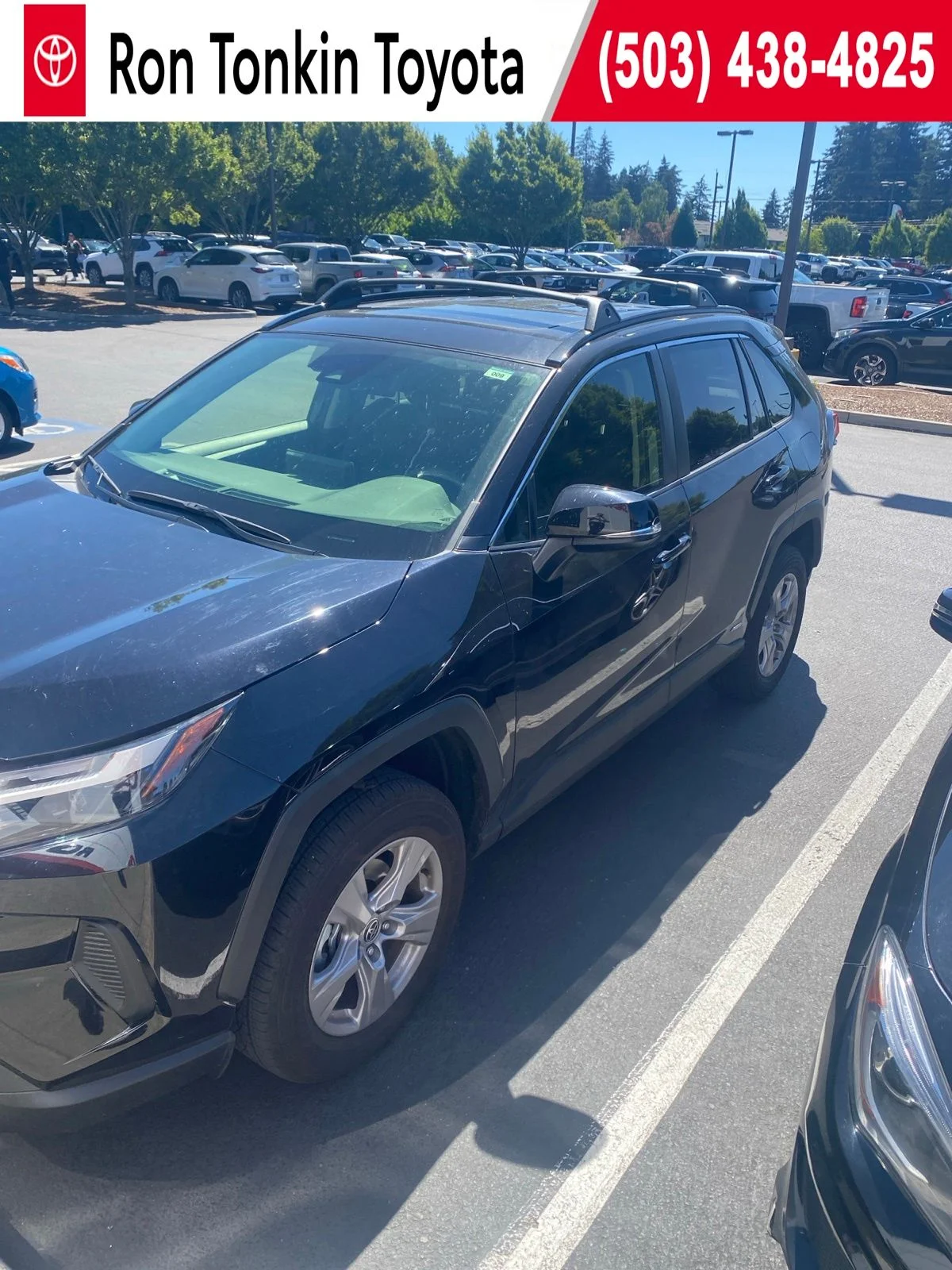 Used 2025 Midnight Black Metallic Toyota XLE image 1