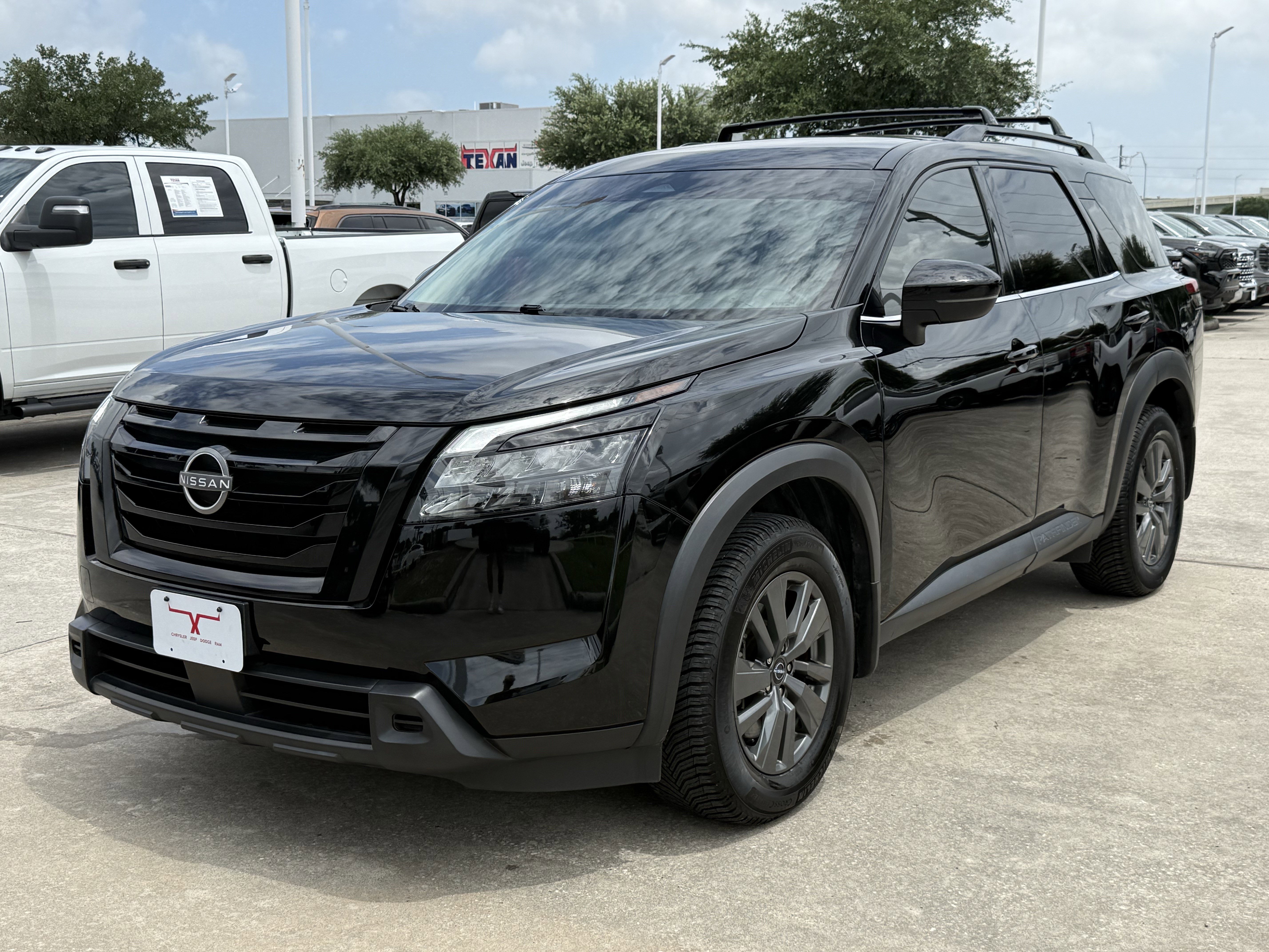 Used 2024 Super Black Nissan SV image 8