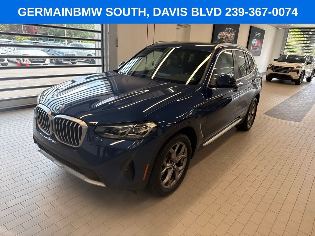 Certified Used 2022 Blue Metallic BMW sDrive30i image 1