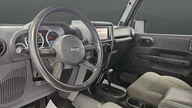 Used 2009 Green Metallic Jeep Rubicon image 12