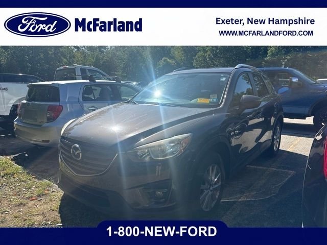 Used 2016 Titanium Flash Mica Mazda Touring image 1