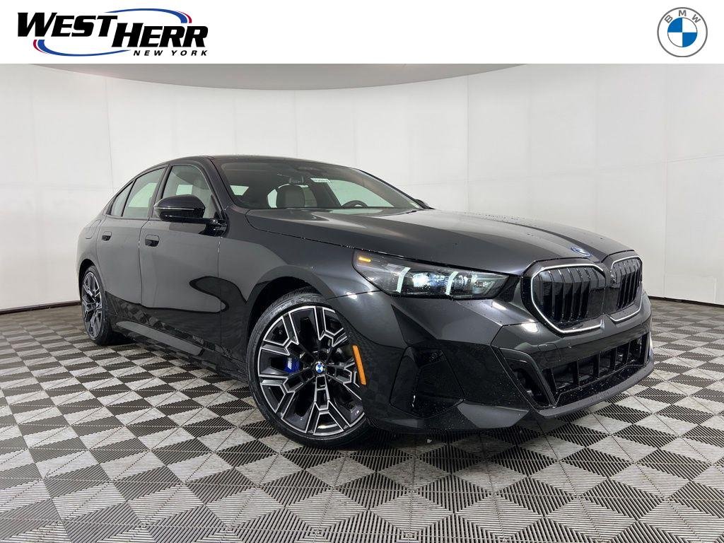 2026 BMW 5 Series 550e xDrive Sedan's photo