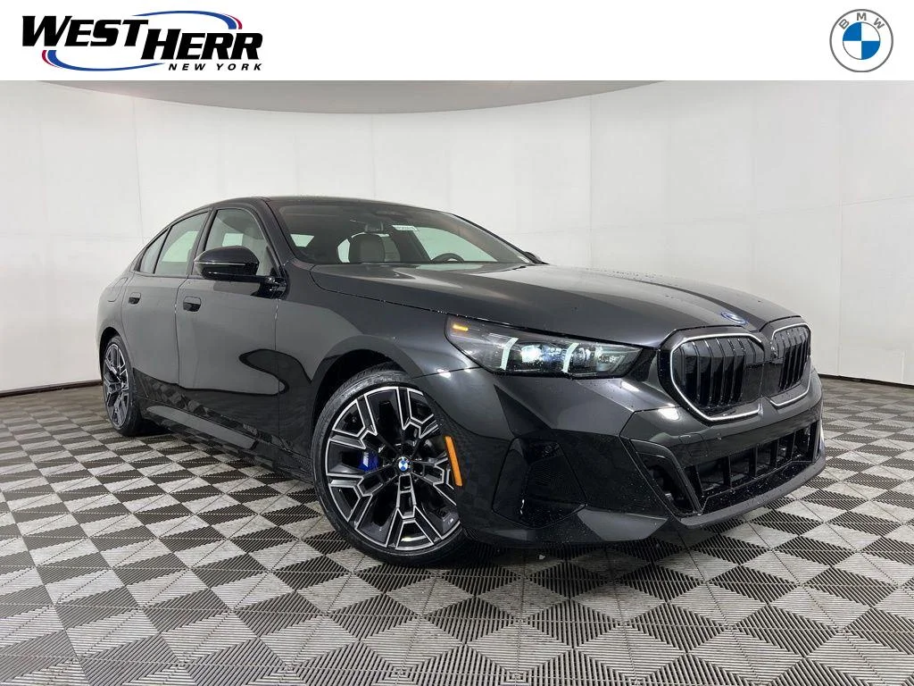 2026 BMW 5 Series 550e xDrive Sedan's photo