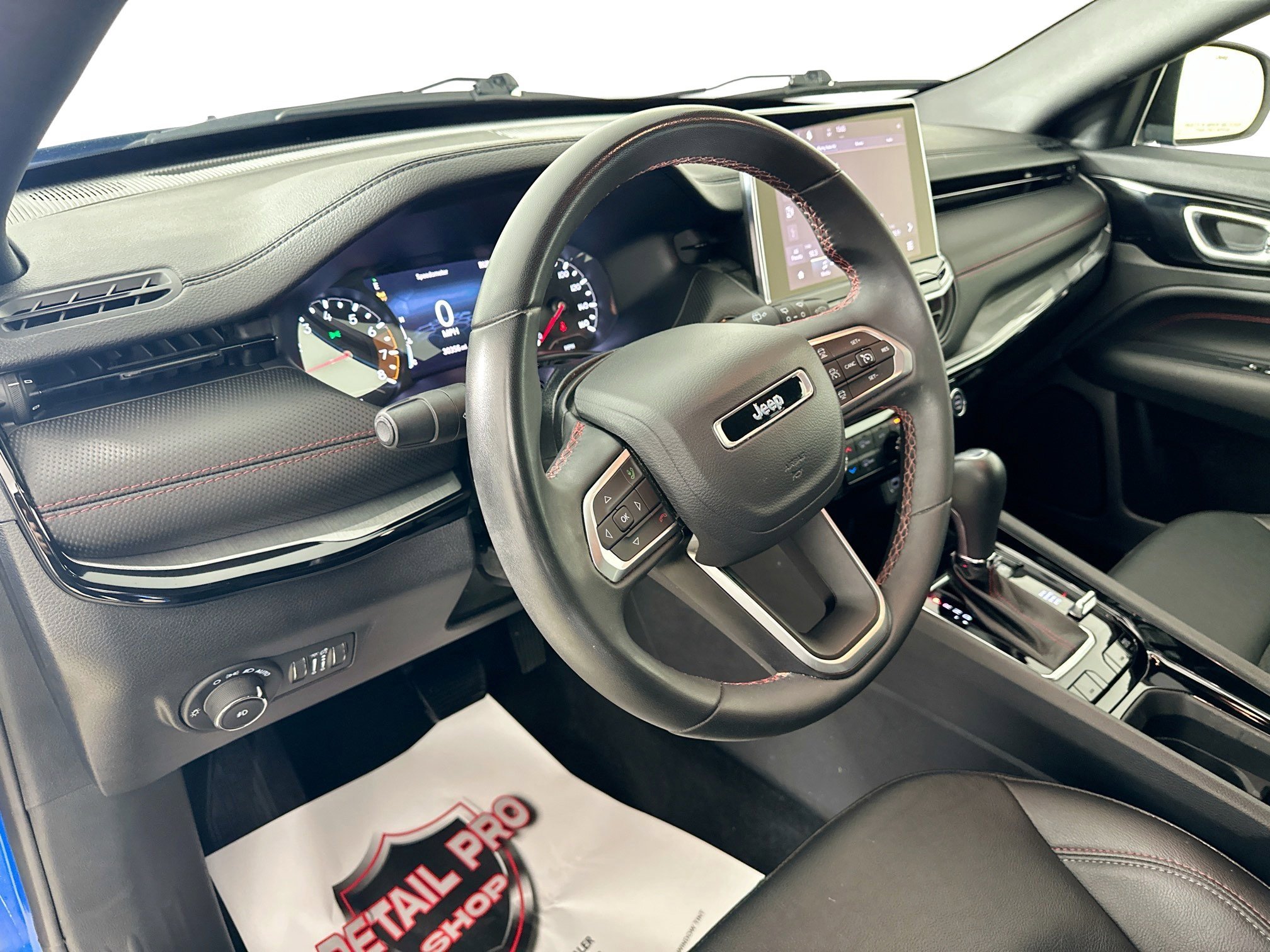 Used 2024 Hydro Blue Pearlcoat Jeep Trailhawk image 9