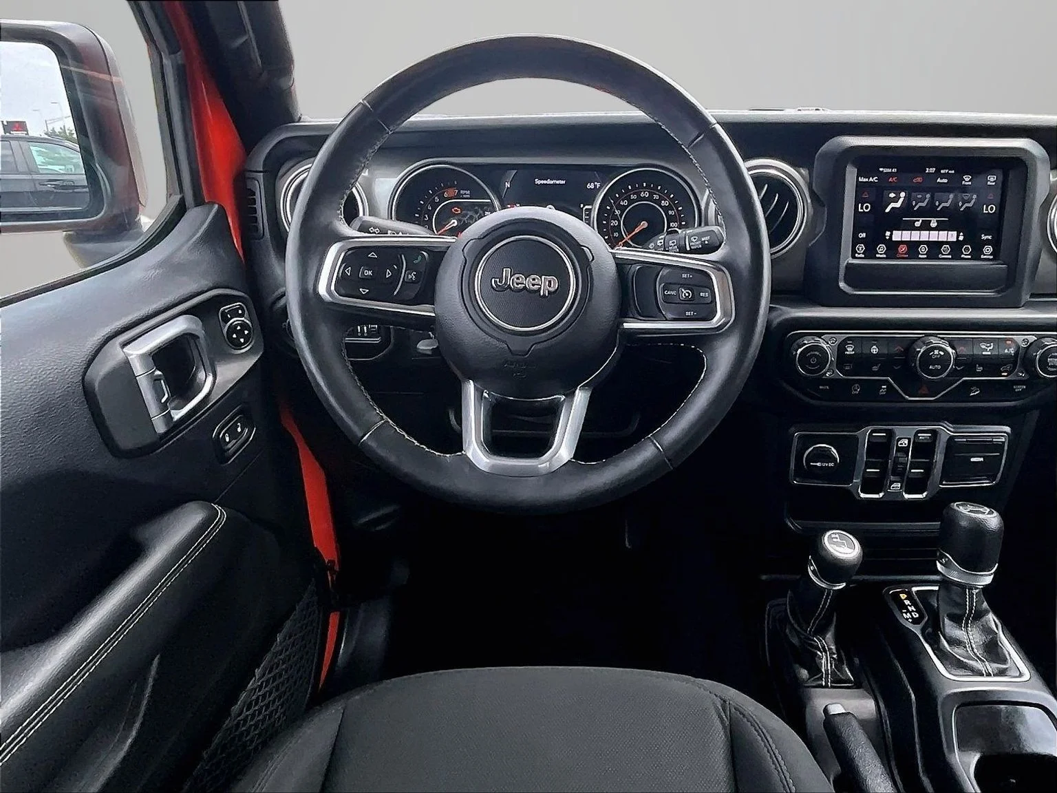 Used 2018 Orange Jeep Unlimited Sahara image 6