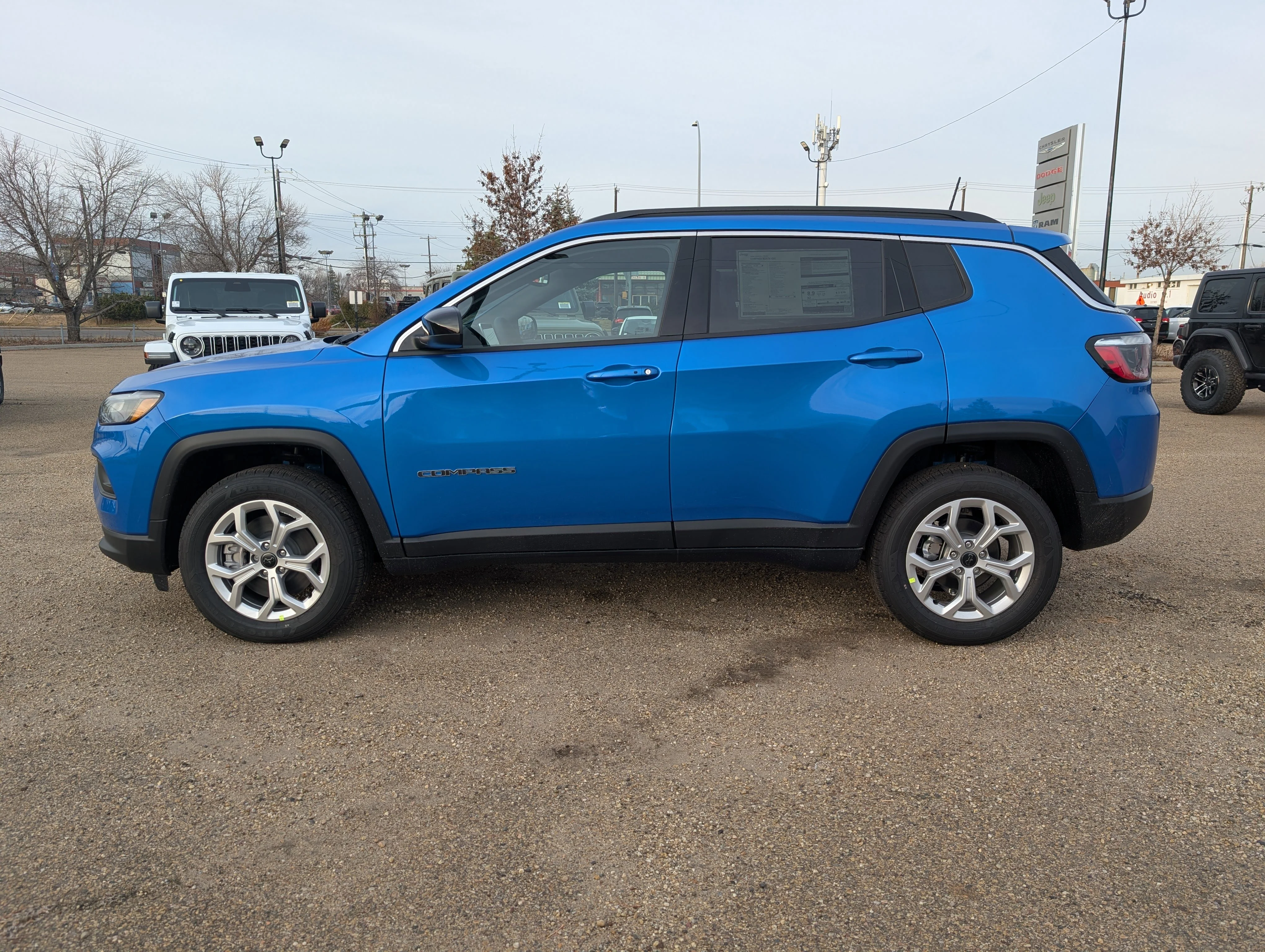 New 2026 Laser Blue Pearl Jeep North image 3