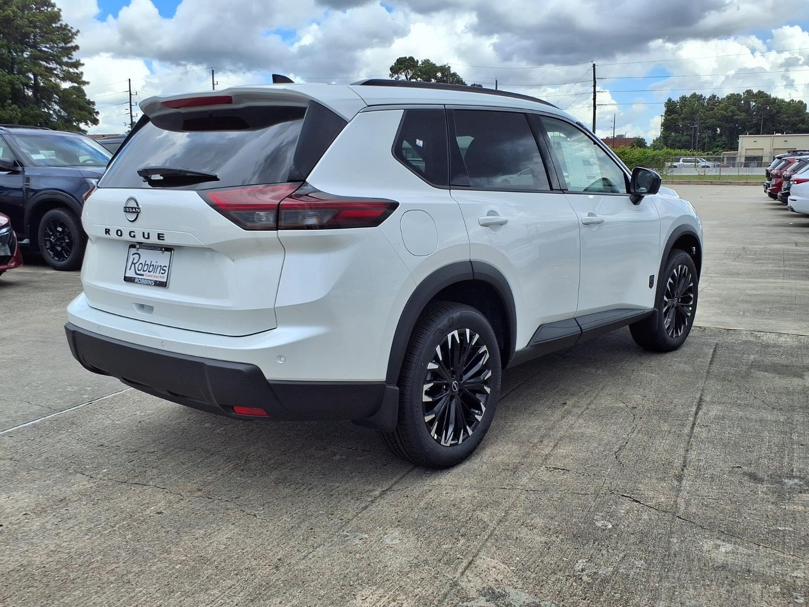 2026 Nissan Rogue Dark Armor™ White at Robbins Nissan
