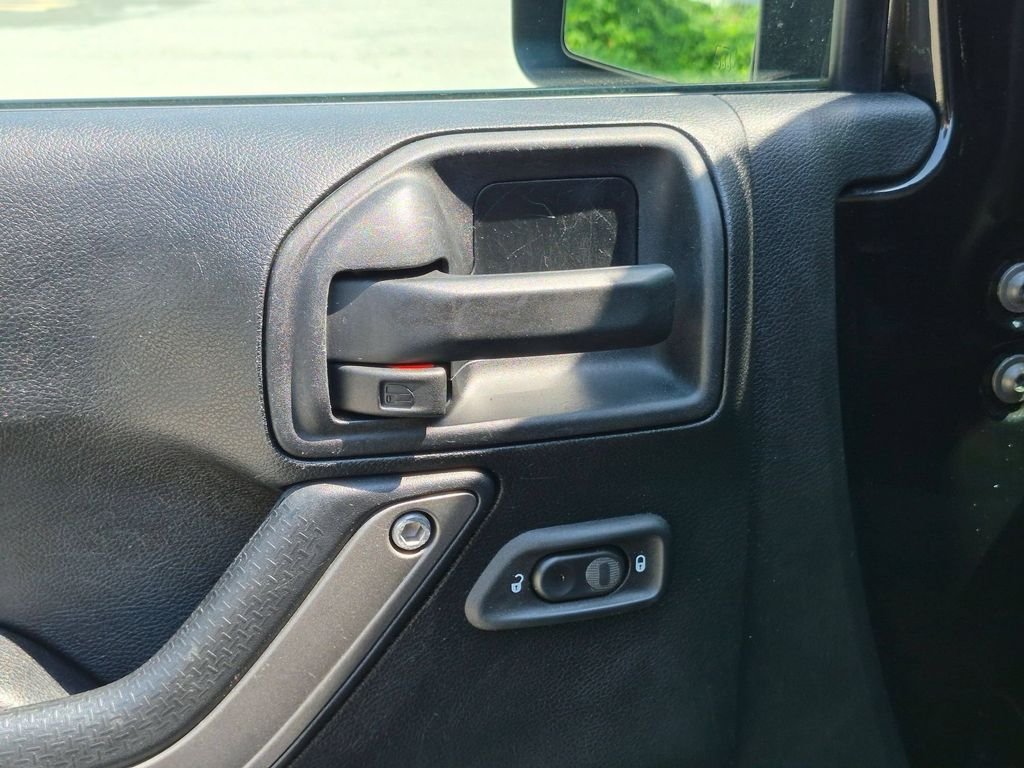 Used 2016 Black Jeep Unlimited Sport image 11