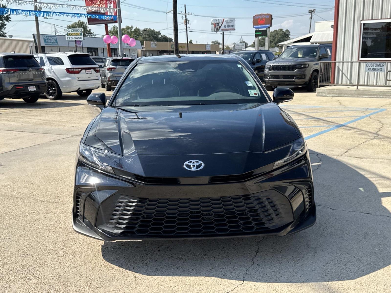 Used 2026 Midnight Black Metallic Toyota SE image 2