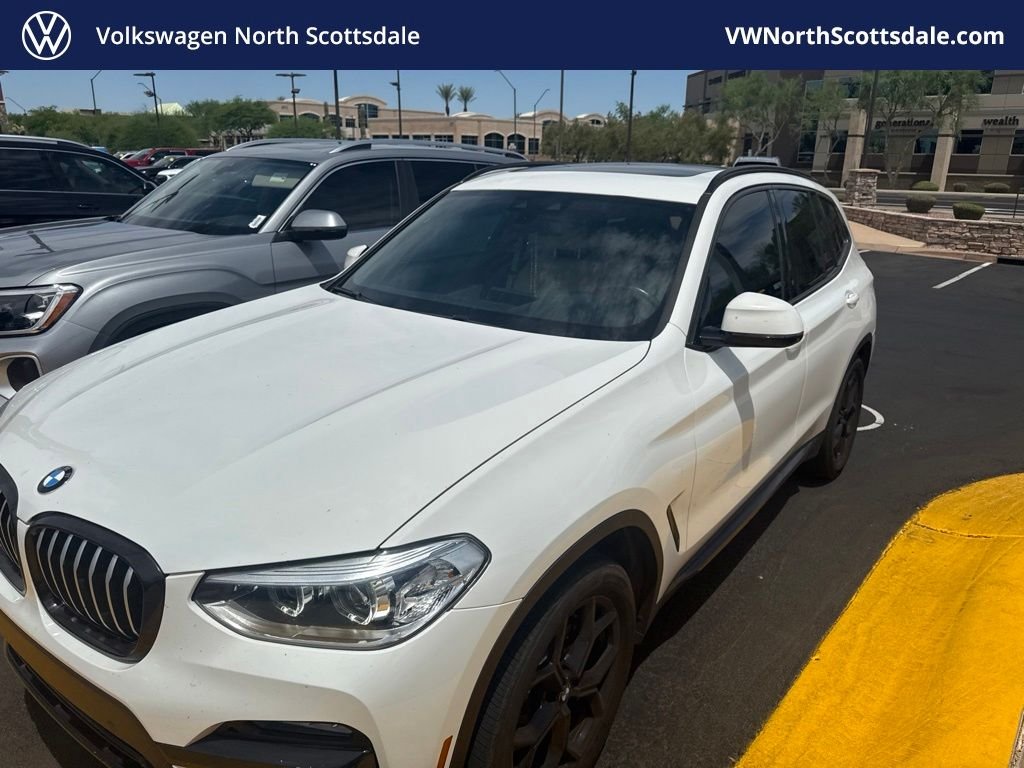 Used 2021 White BMW sDrive30i image 1