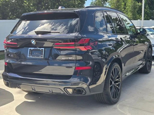 Certified Used 2024 Carbon Black Metallic BMW xDrive40i image 4