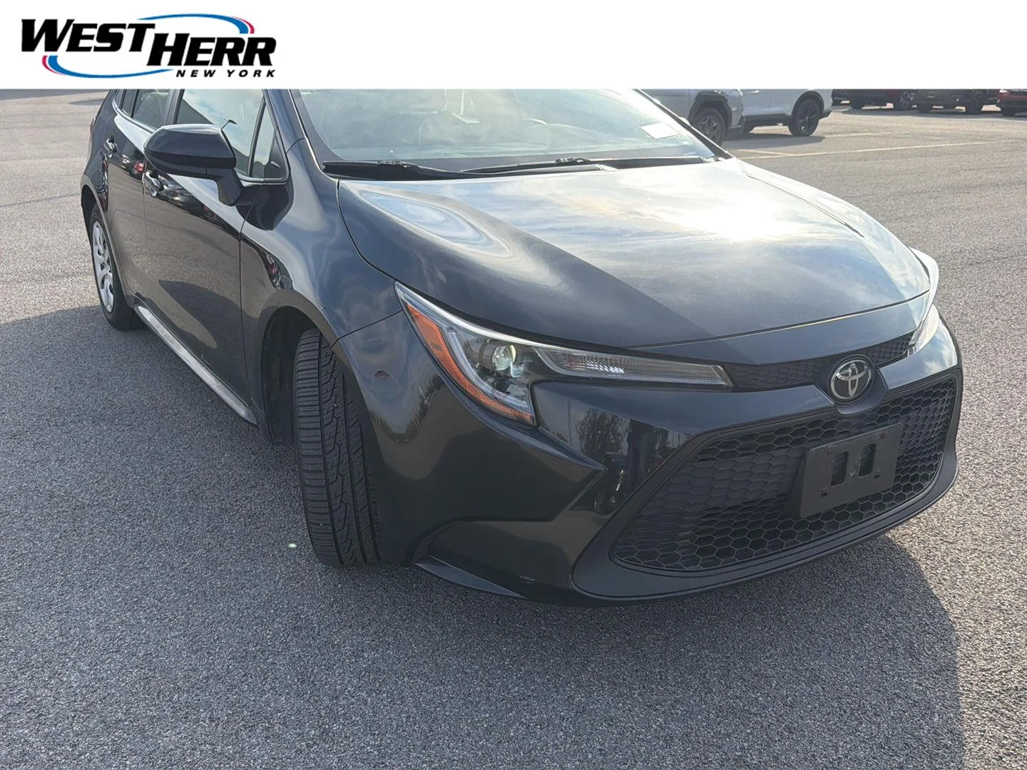 Used 2020 Black Sand Pearl Toyota LE image 1