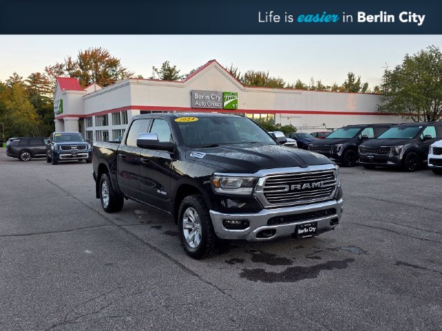 Used 2024 Diamond Black Ram Laramie image 1