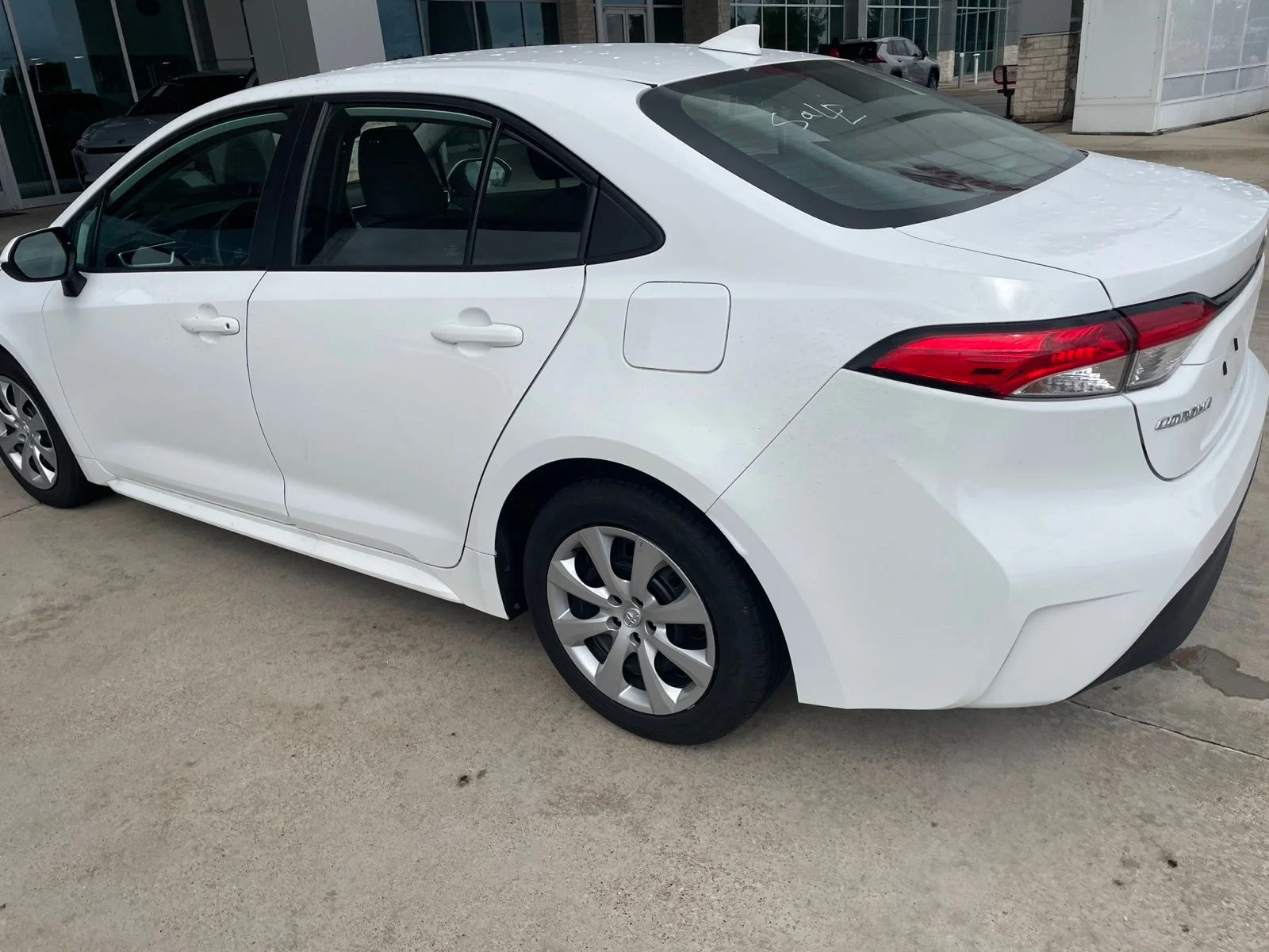 Used 2024 White Toyota LE image 13