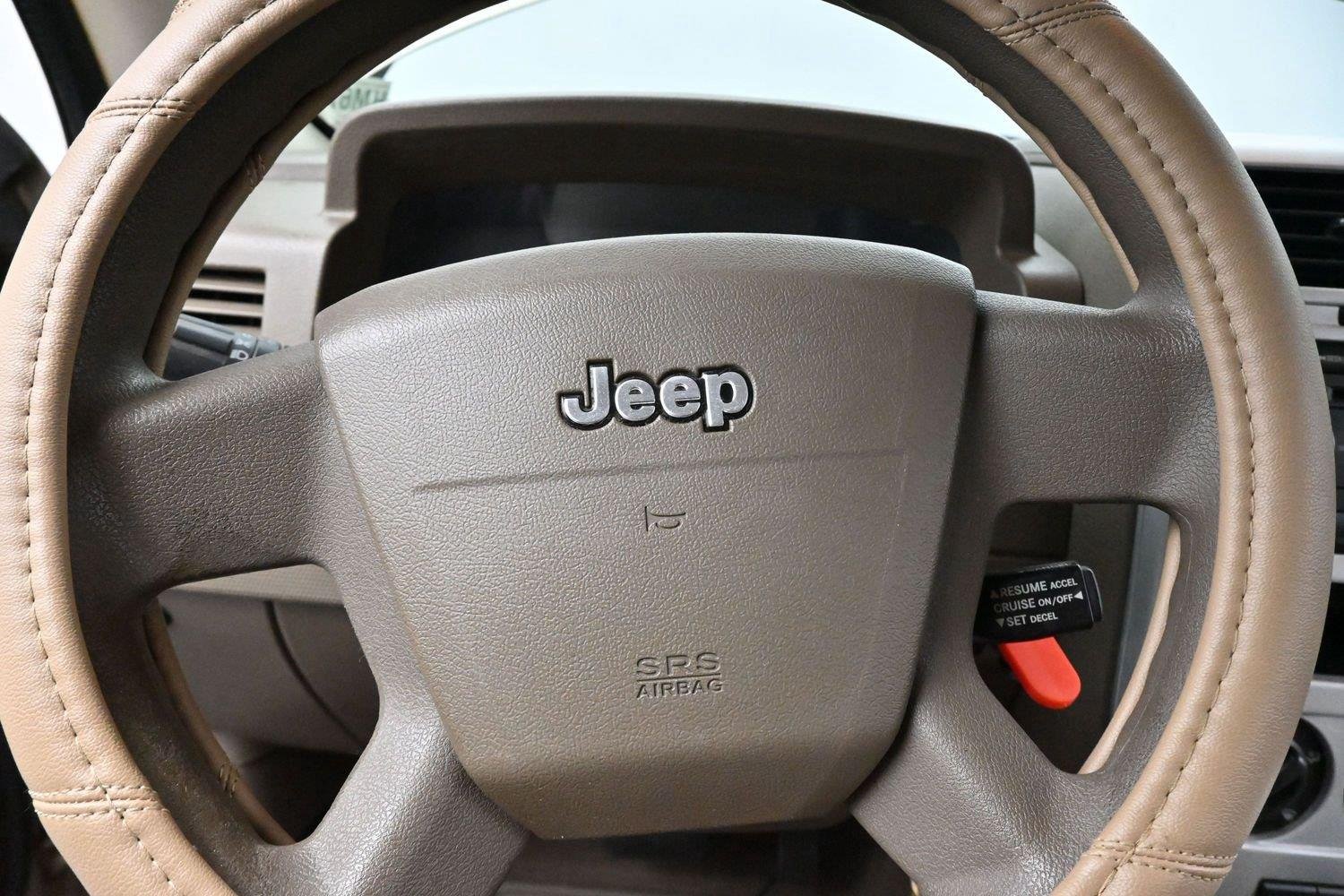 Used 2008 Light Khaki Metallic Jeep Sport image 15