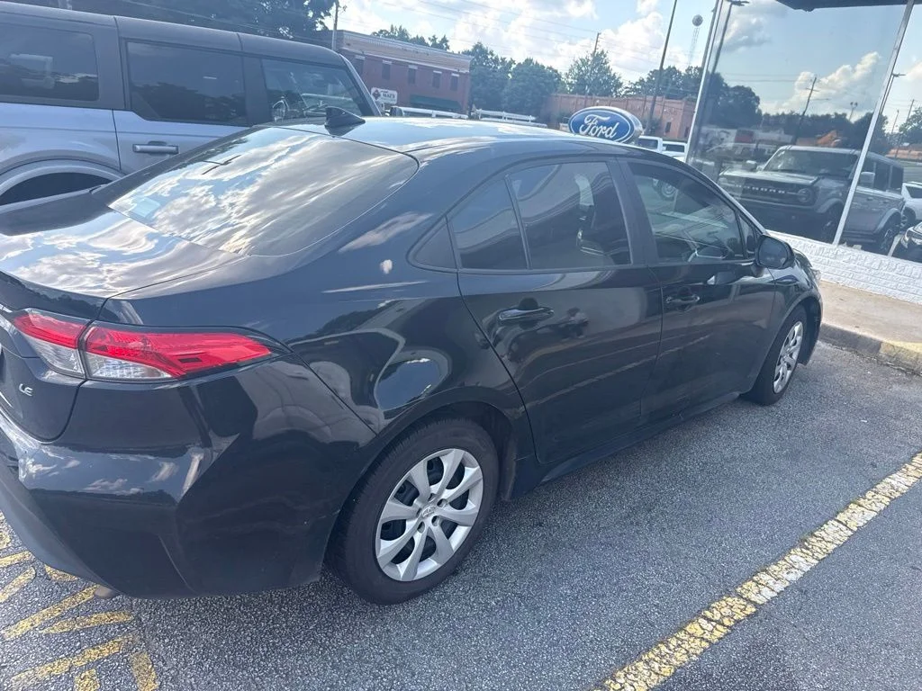 Used 2024 Black Toyota LE image 4