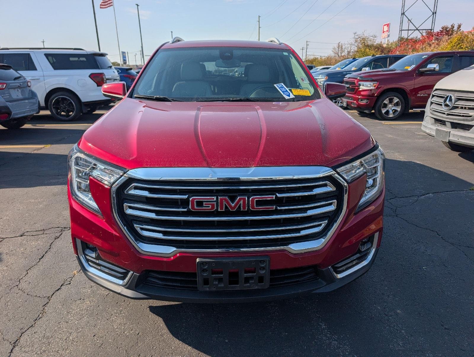 Used 2023 Volcanic Red Tintcoat GMC SLT image 2