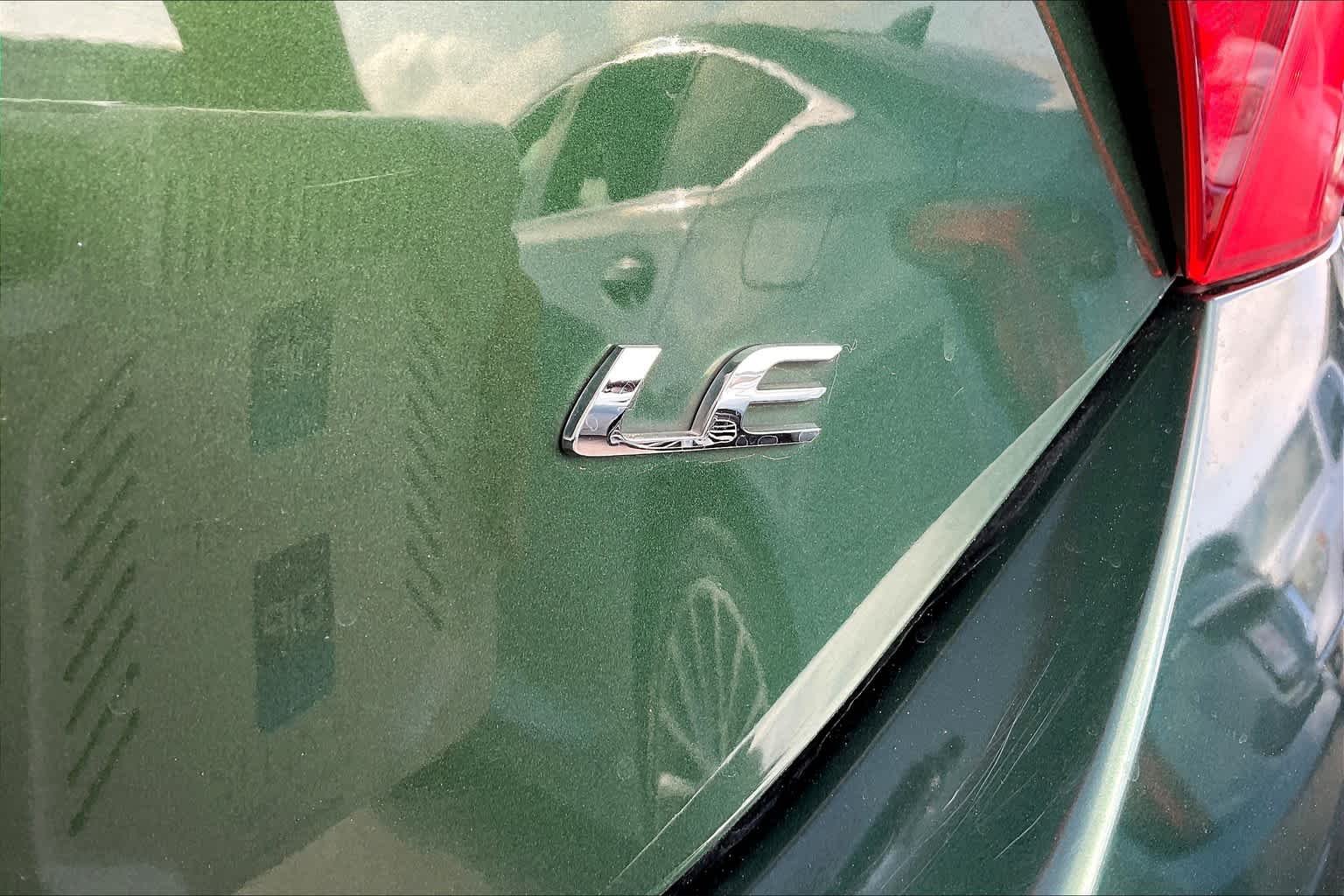 Used 2015 4Evergreen Mica Toyota LE image 10