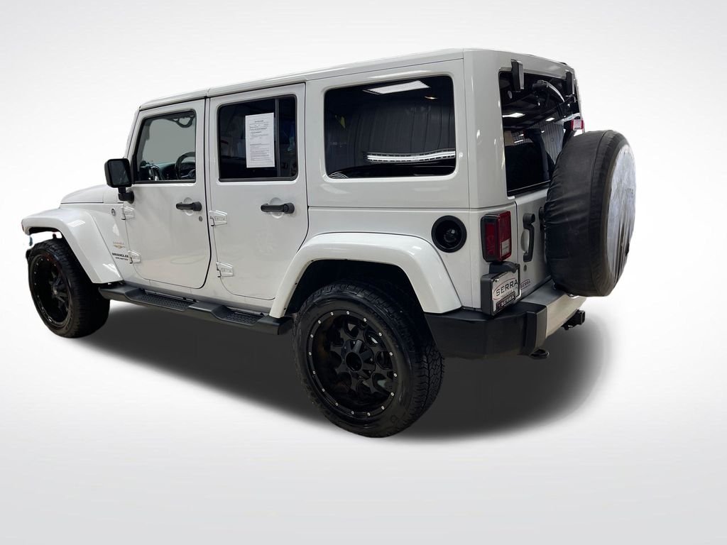Used 2014 White Jeep Unlimited Sahara image 4