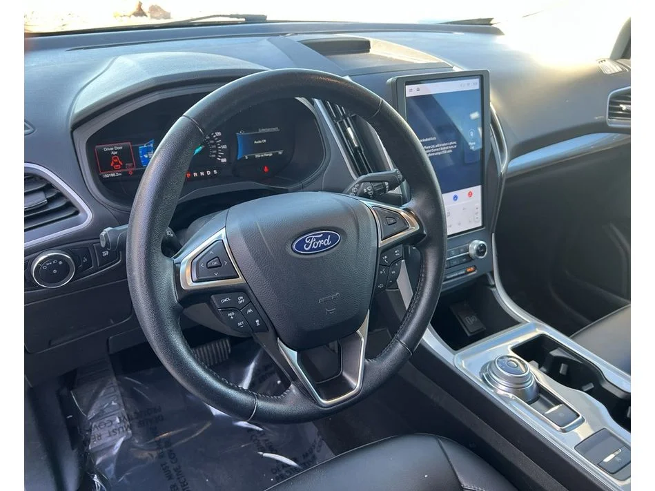 Used 2024 Agate Black Metallic Ford SEL image 13