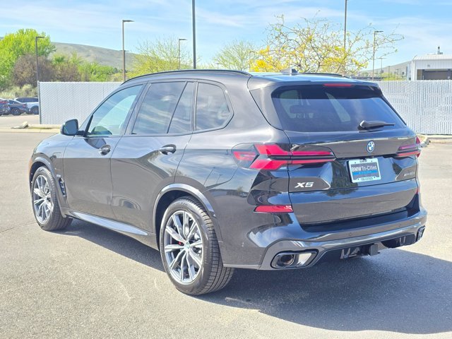 New 2026 Black Sapphire Metallic BMW xDrive50e image 36