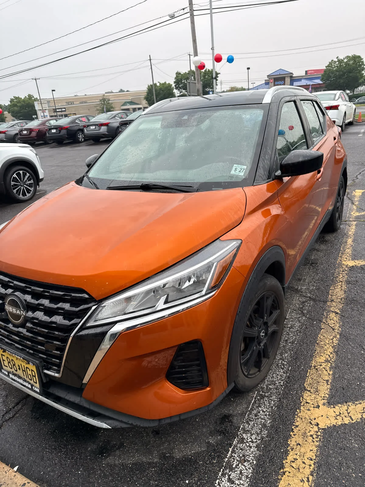 Used 2022 Monarch Orange Metallic/Super Black Nissan SV image 4
