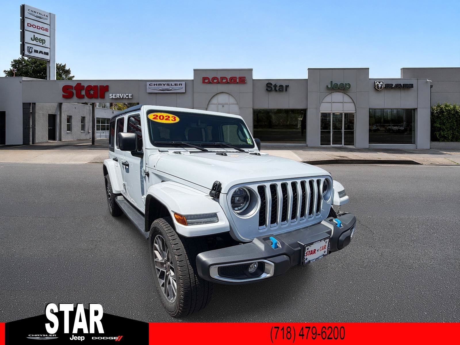 Used 2023 Bright White Clearcoat Jeep Sahara image 1