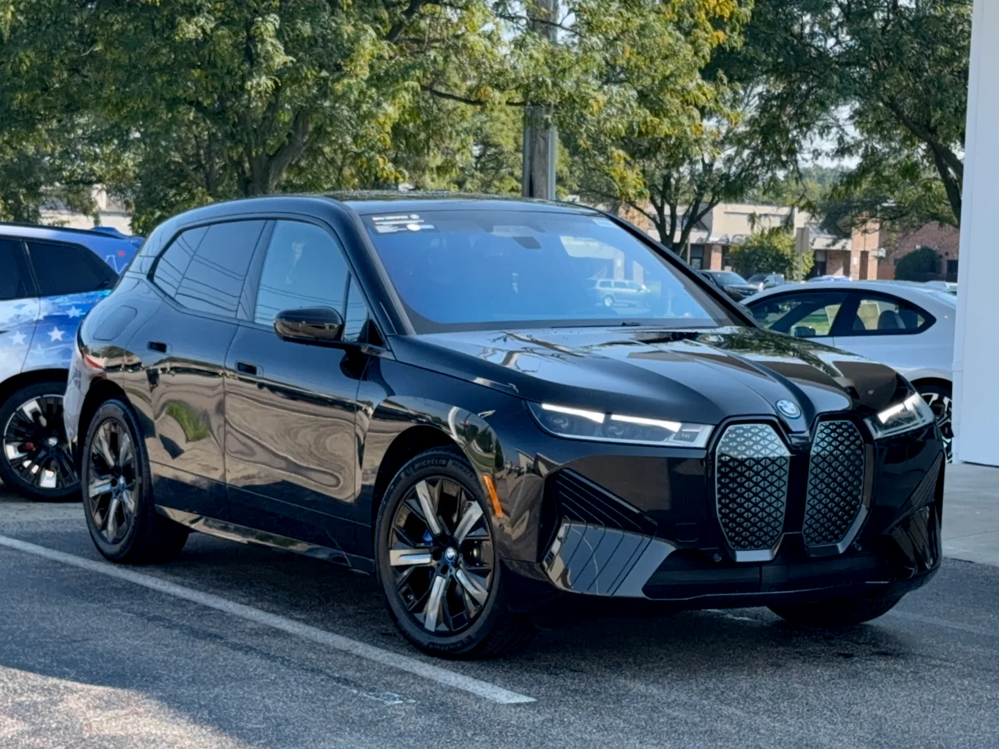 Certified Used 2024 Black Sapphire Metallic BMW xDrive50 image 1