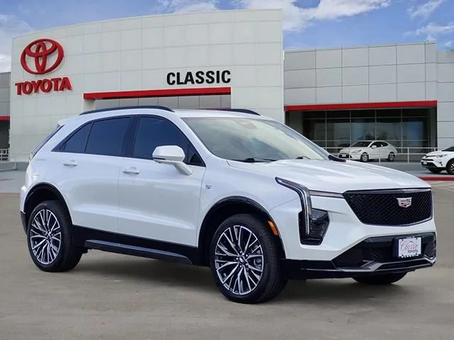 Used 2025 Crystal White Tricoat Cadillac Sport image 1